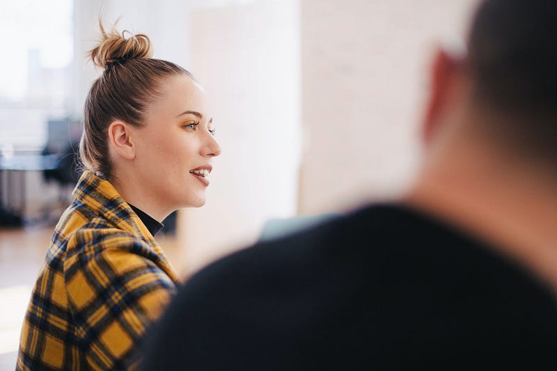 Empathetic leader engaging with team members