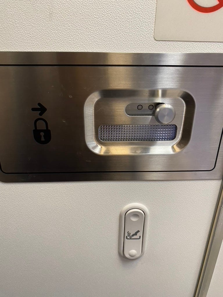 Lavatory door locking mechanism on an aircraft.