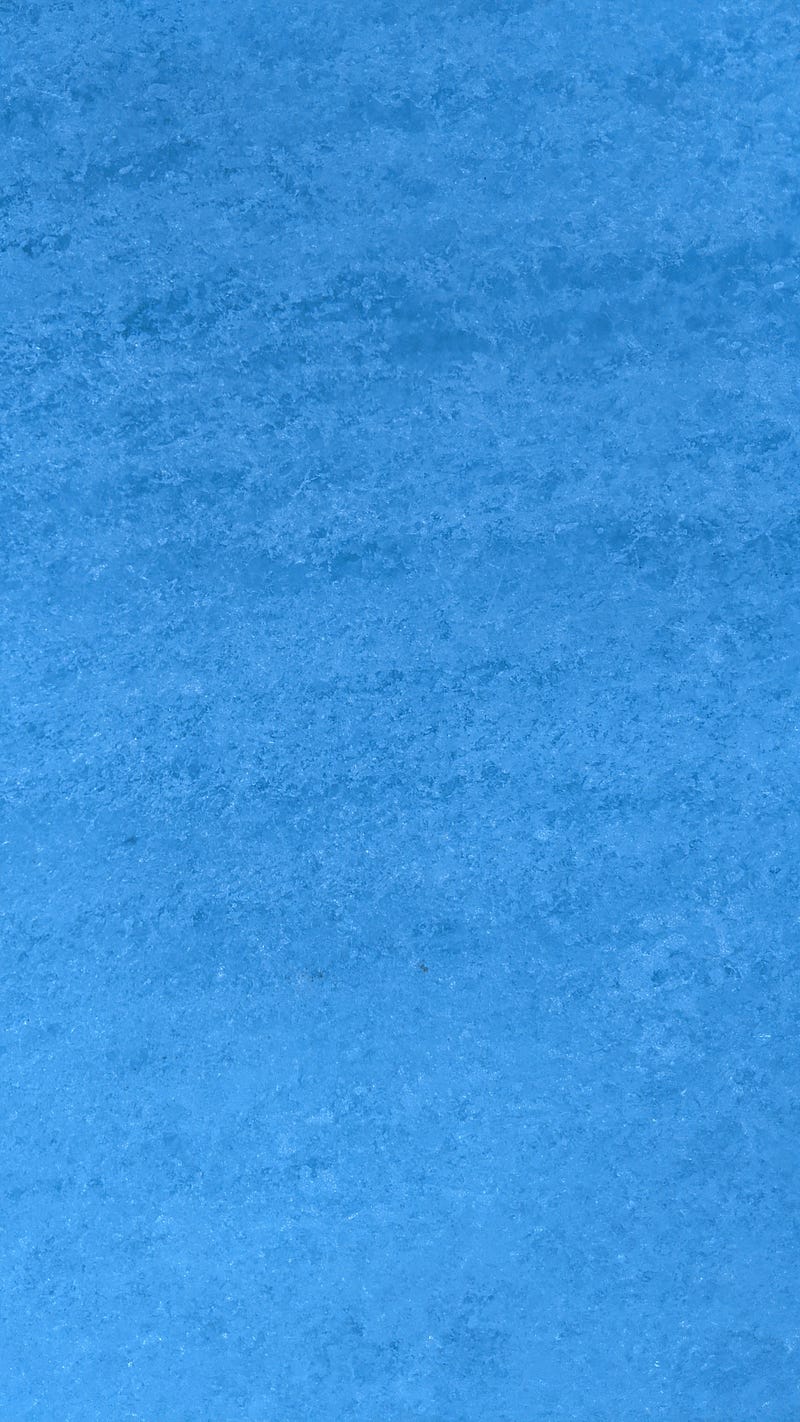 Blue hues in the ice wall